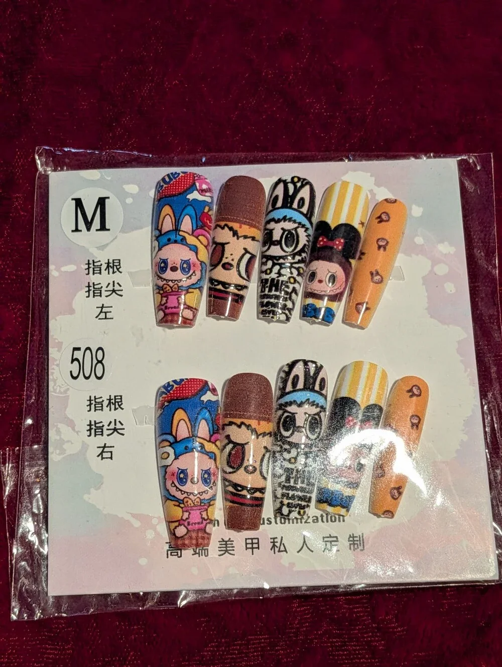 M Cartoon Character Press-On Nail Set in Orange and Blue Size M